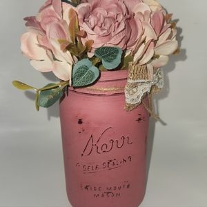Vintage distressed painted dusty rose quart mason jar with flower bouquet